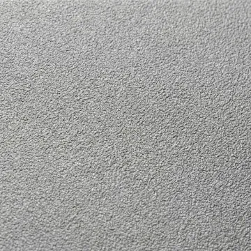 Close-up of professionally sandblasted metal surface showing uniform profile texture ready for coating