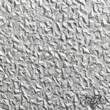 Close-up of properly profiled metal surface after abrasive blasting showing anchor pattern