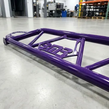 Close-up of smooth, uniform powder coated industrial metal surface showing professional finish quality