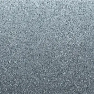 Close-up of steel surface after shot blasting showing uniform texture profile