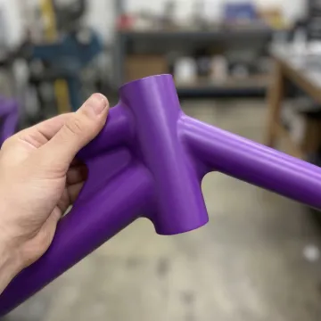 Close-up of smooth powder coated plastic surface showing quality finish