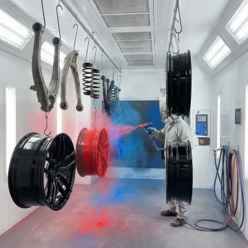 Professional automotive powder coating application on car parts in Tampa Bay facility