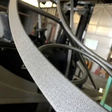 Close-up of properly sandblasted metal surface showing uniform profile