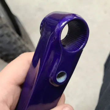 Close-up of expertly powder coated metal surface with smooth, durable finish