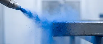 Close-up of powder coated metal fabrication showing smooth, durable finish quality