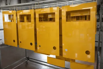 Consultant analyzing powder coating quality control data