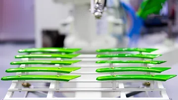 Professional coating process showing metal components through preparation and finishing stages