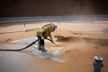 Close-up of properly prepared metal surface after industrial abrasive blasting
