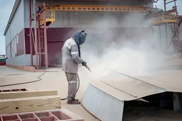Professional sandblasting process on industrial metal components