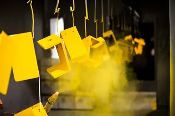 Professional powder coating process showing surface preparation and finishing steps