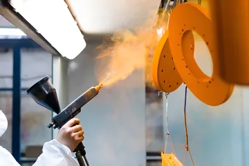 Industrial electrostatic powder coating application on large metal fabrication