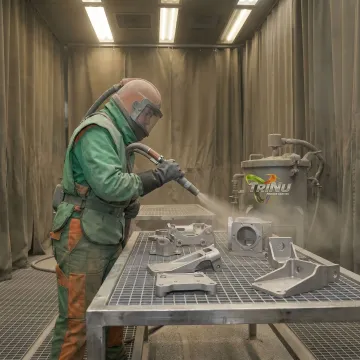 Technician preparing aerospace parts for coating