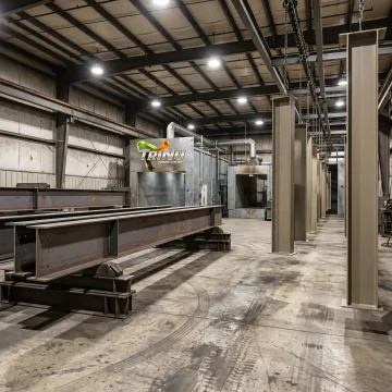 Industrial structural steel being powder coated