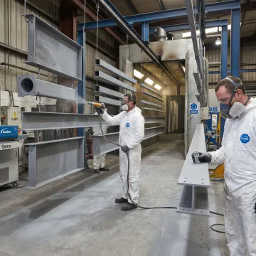 Marine-grade coating on steel components