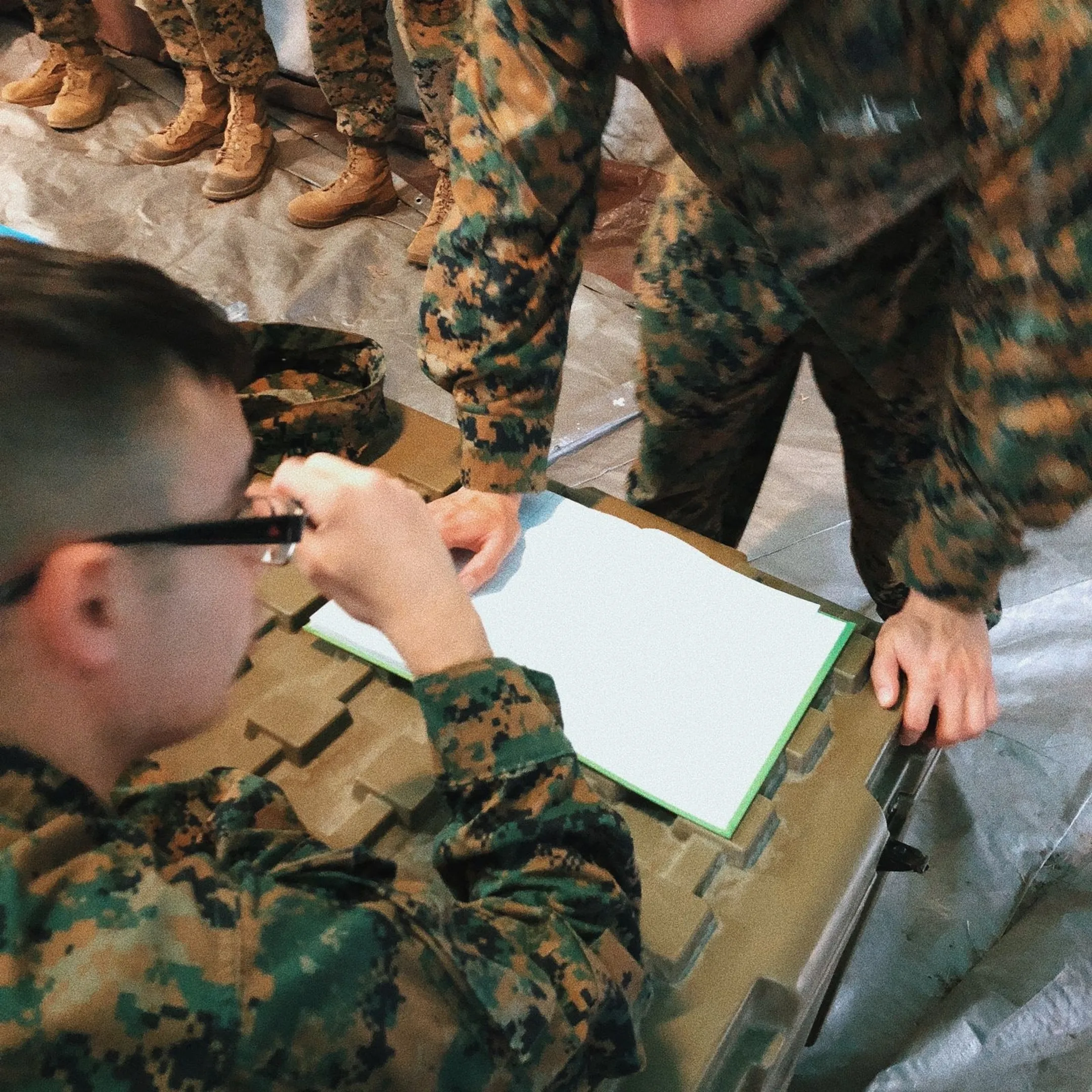 Military unit leaders collaborating during an interactive communication seminar
