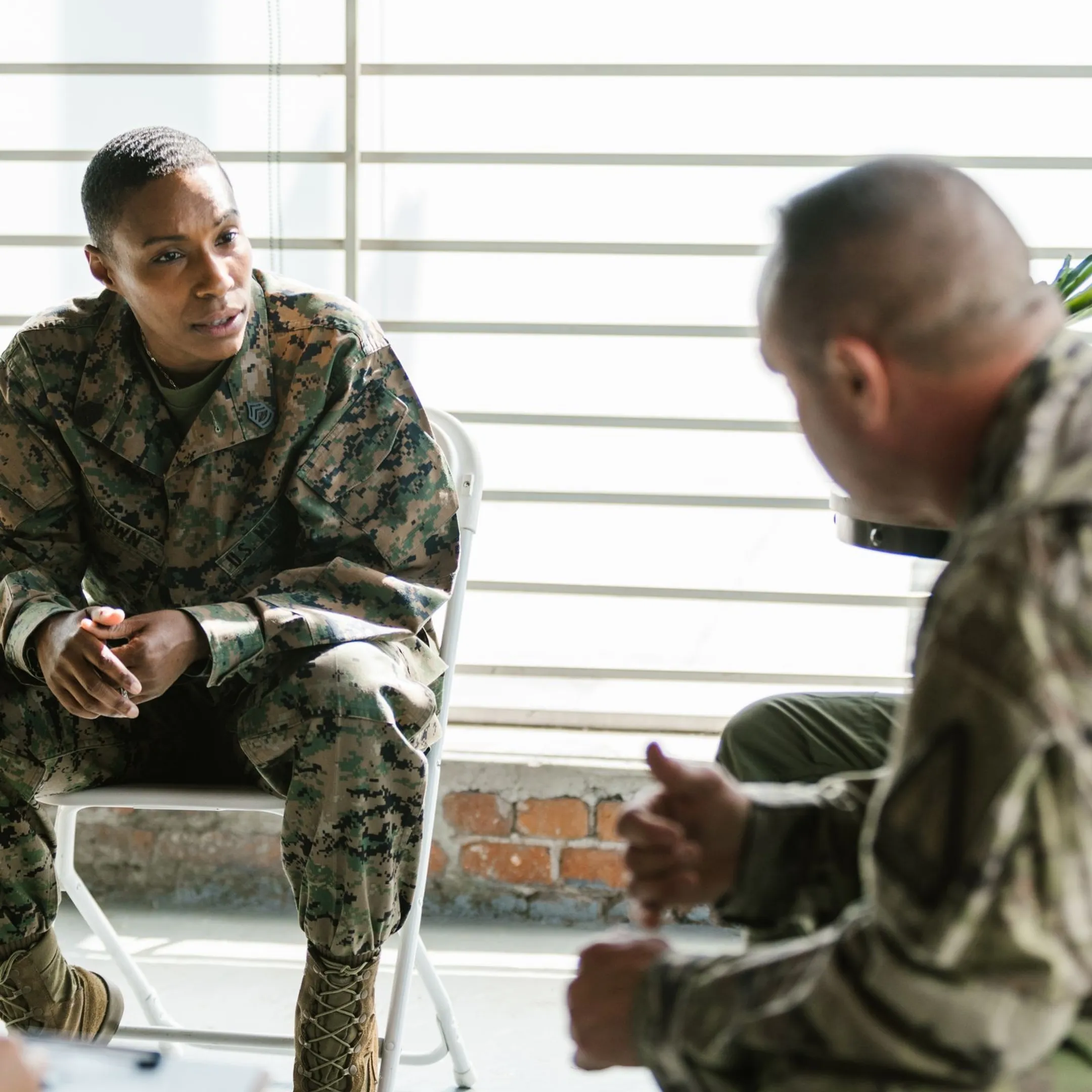 Military leaders engaging in strategic conflict management and communication exercises