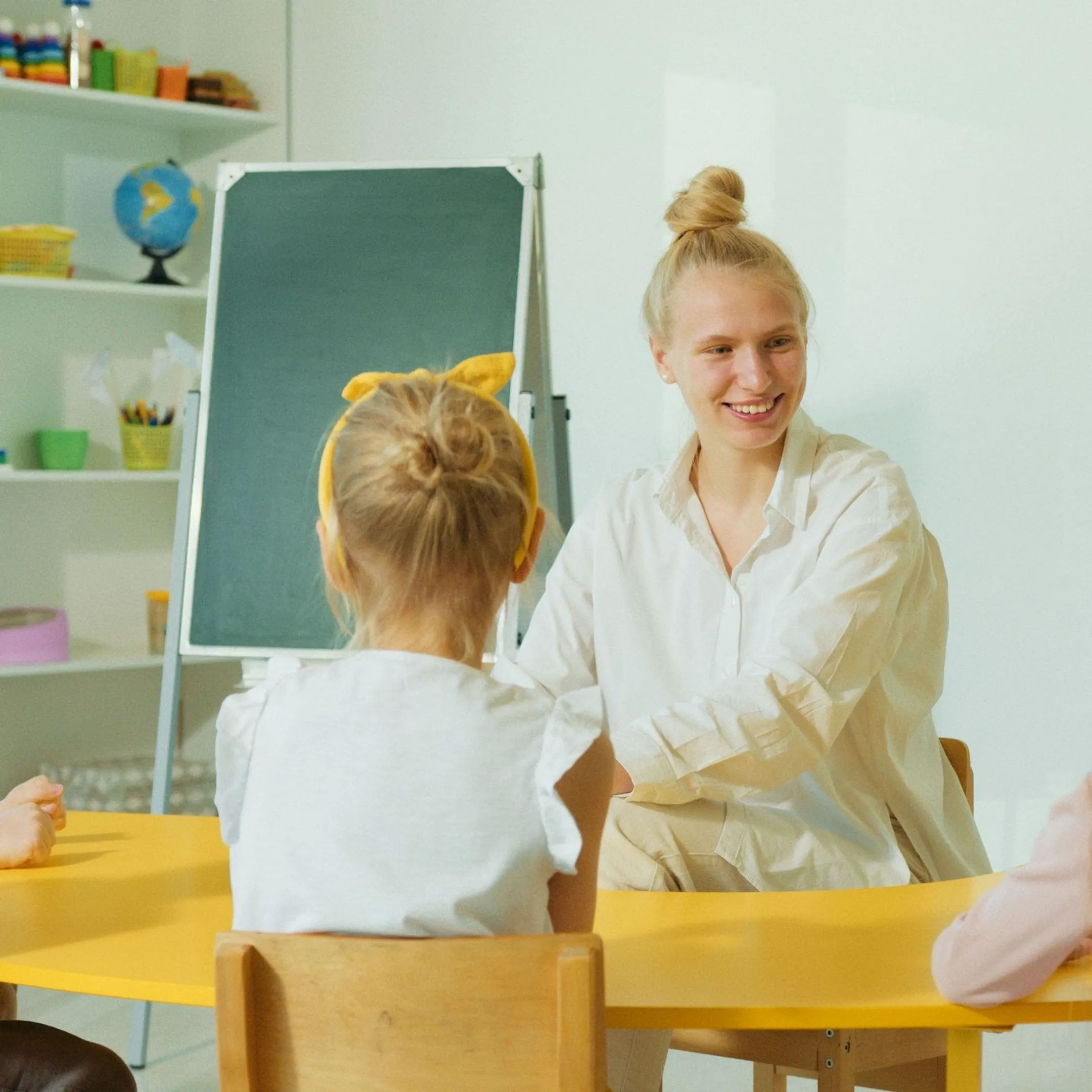 Educators and students engaging in a collaborative social emotional learning classroom workshop