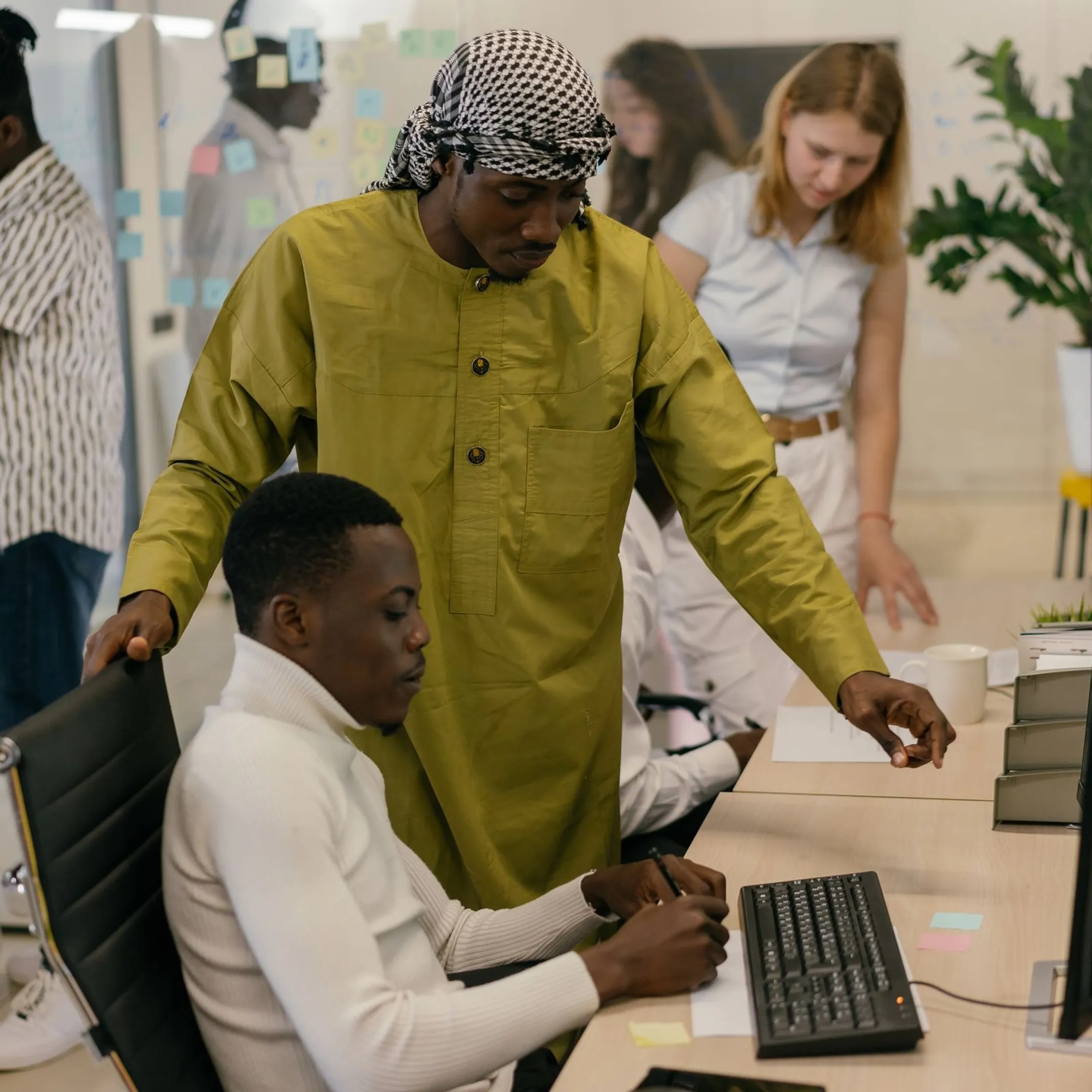 Corporate professionals collaborating during a workplace culture training session