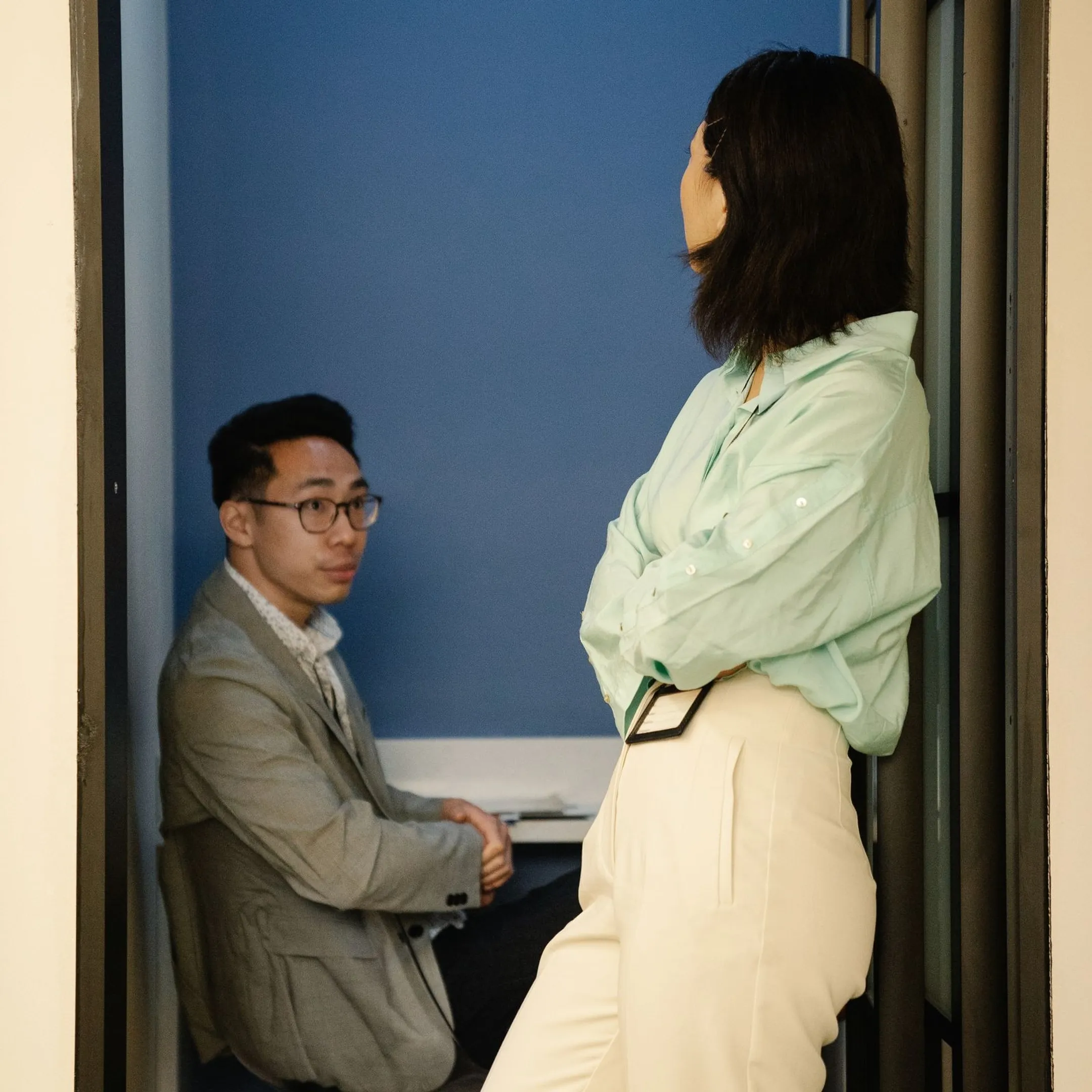 Employees participating in an interactive workplace communication training session