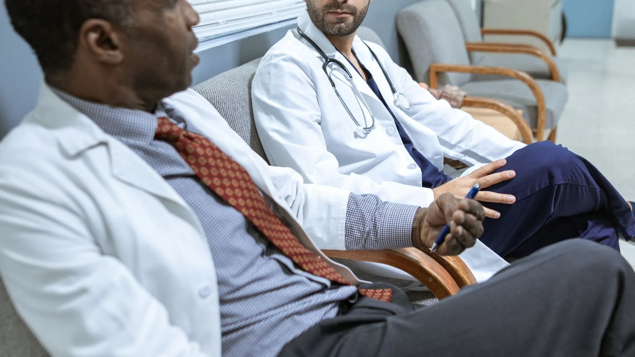 Hospital staff using AI diagnostic technology and telehealth platforms