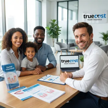 Friendly dental insurance advisor consulting with a Nacogdoches family about affordable coverage options