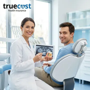 Professional dentist examining patient's dental implants in modern Bridgeport clinic