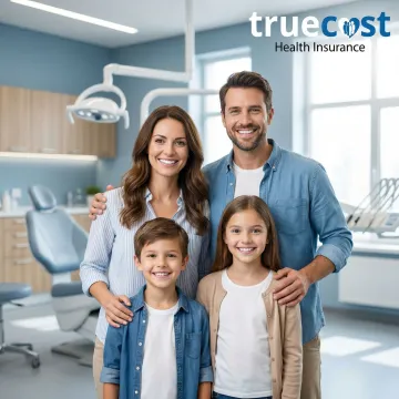 Family smiling with healthy teeth after receiving dental insurance coverage in Brighton, MI