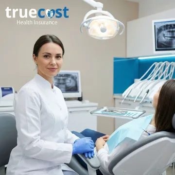 Emergency dental care professional treating patient with urgent dental needs