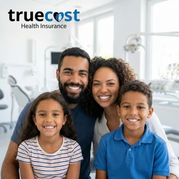 Family smiling together after receiving affordable dental care in Chesterfield, MO