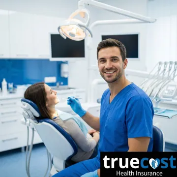 Dentist performing preventive dental examination on patient