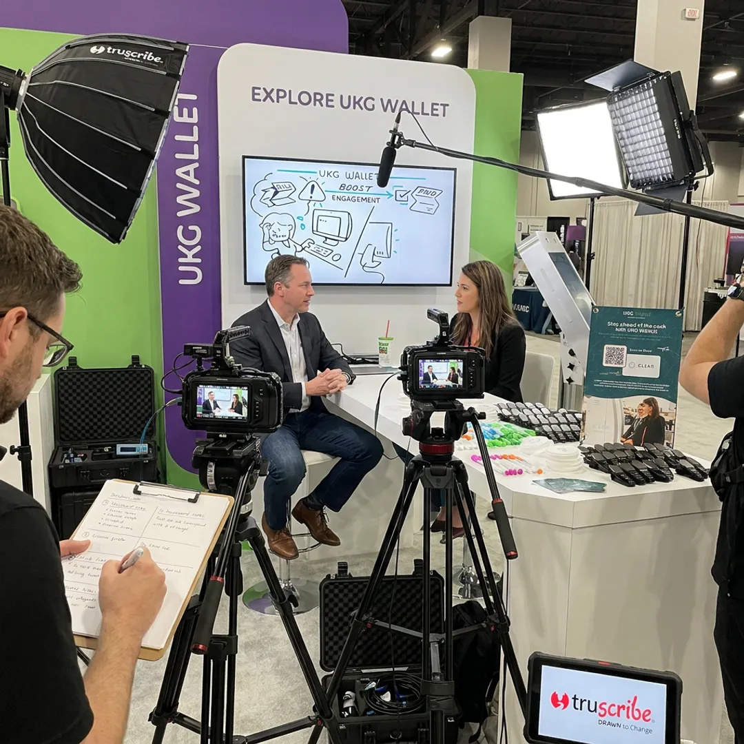 Professional video production crew filming a business interview