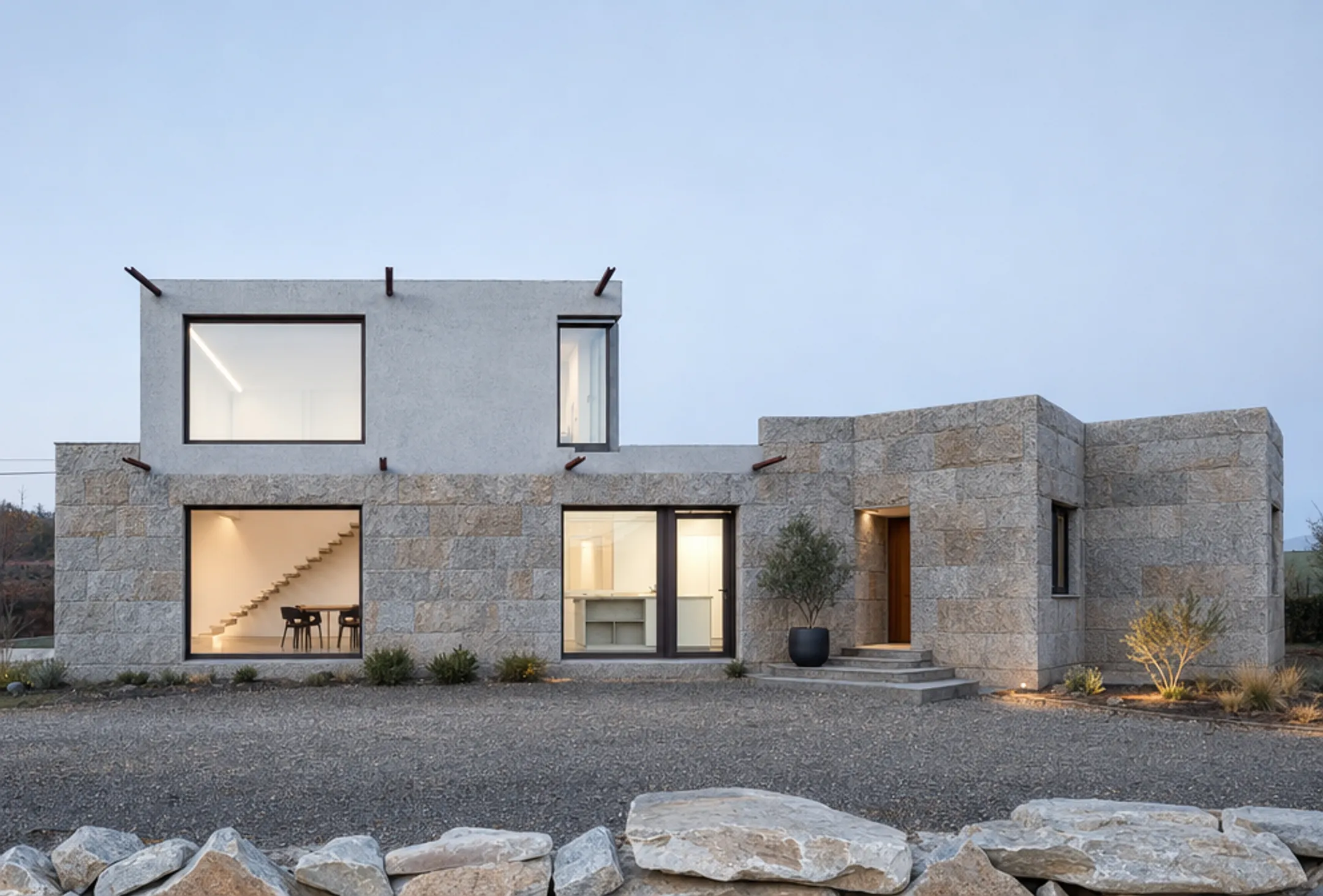 Granite stone exterior facade on modern house showing texture and color