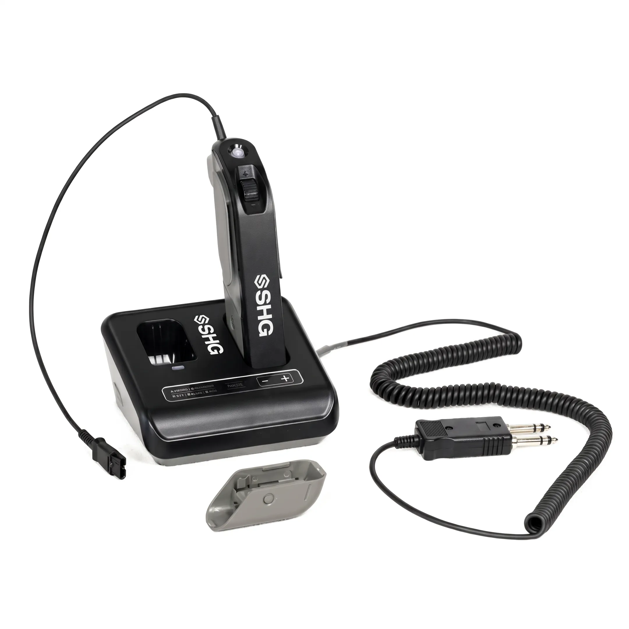 Professional dispatch headset and amplifier beside an emergency communications console