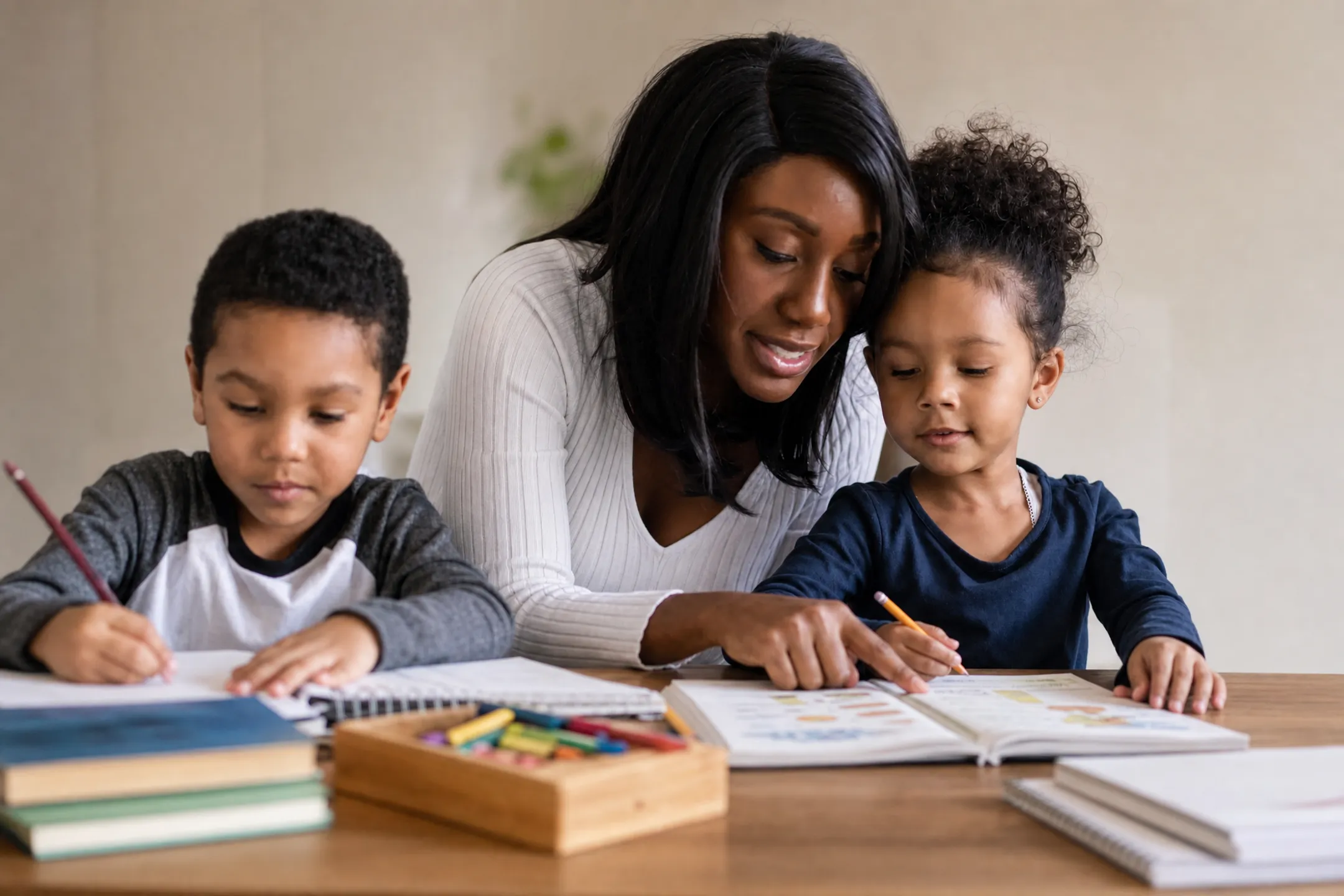 Parent and child doing homeschool lessons at kitchen table