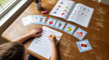 Elementary homeschool student practicing Latin vocabulary with printable worksheets