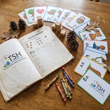 Preschool learning materials arranged for a hands-on lesson
