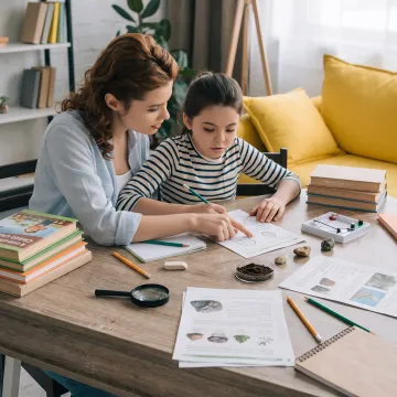Parent guiding a fourth grader through a homeschool lesson