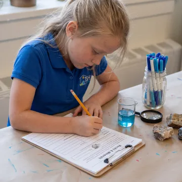 Child completing a hands-on integrated learning activity
