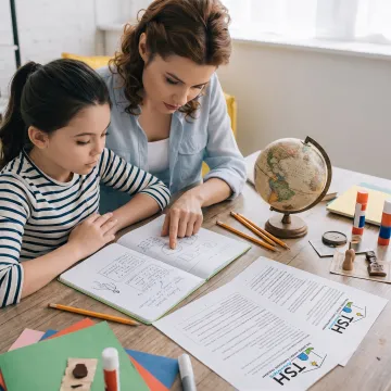 Homeschool parent preparing a history lesson