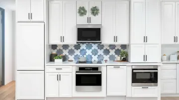 Compact modern kitchen with counter-depth appliances and space-saving multi-function units