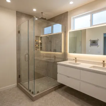 Remodeled bathroom with modern tile and fixtures
