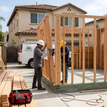 ADU construction crew framing a backyard unit
