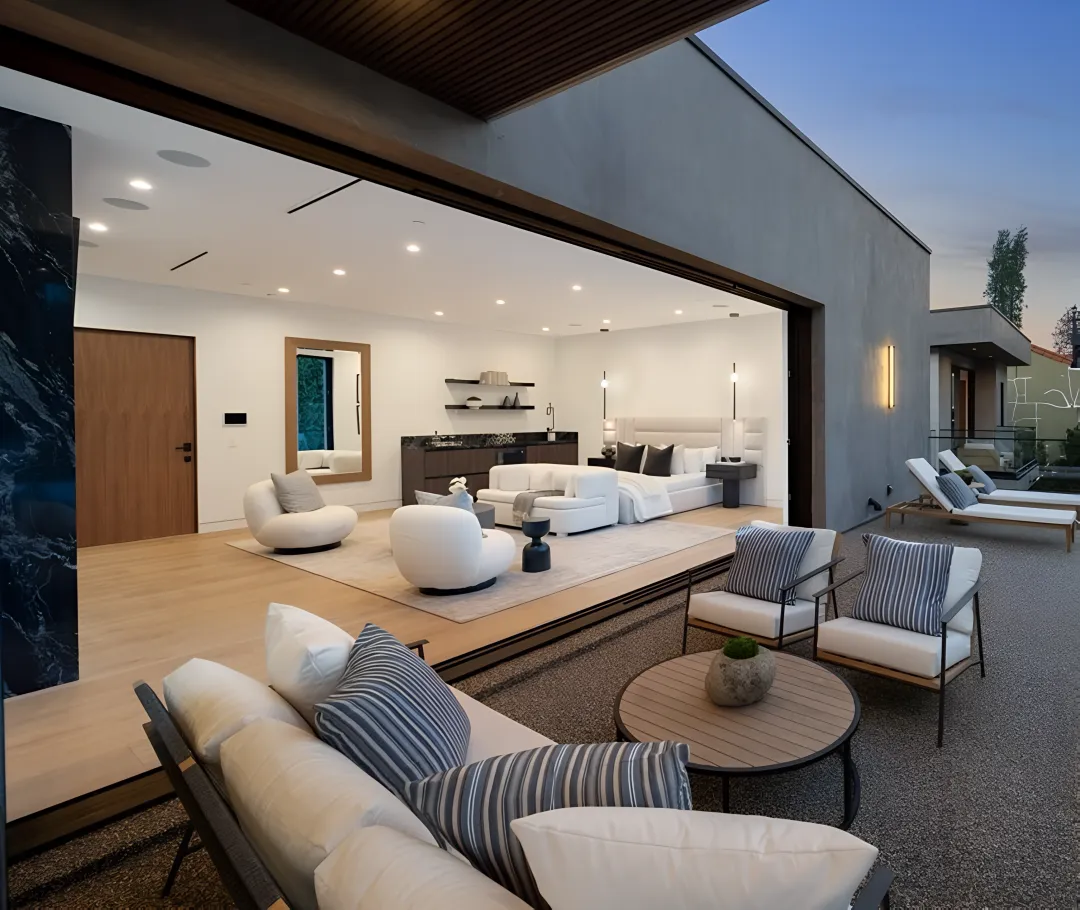 Contractor reviewing ADU plans at a residential property