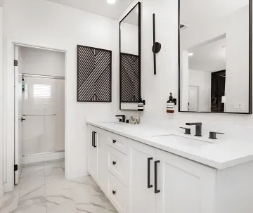 Remodeled bathroom with modern tile and fixtures