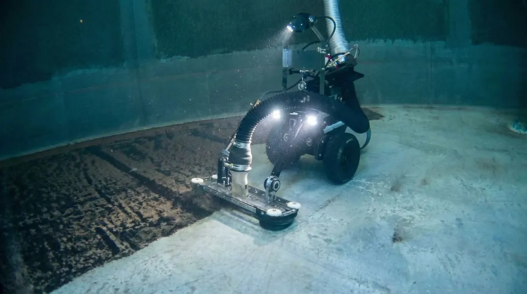 Underwater inspection robot cleaning inside large municipal water storage tank