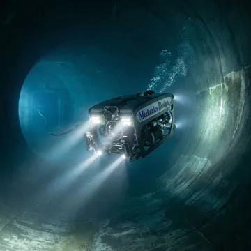 Remotely operated underwater inspection robot inside a water storage tank