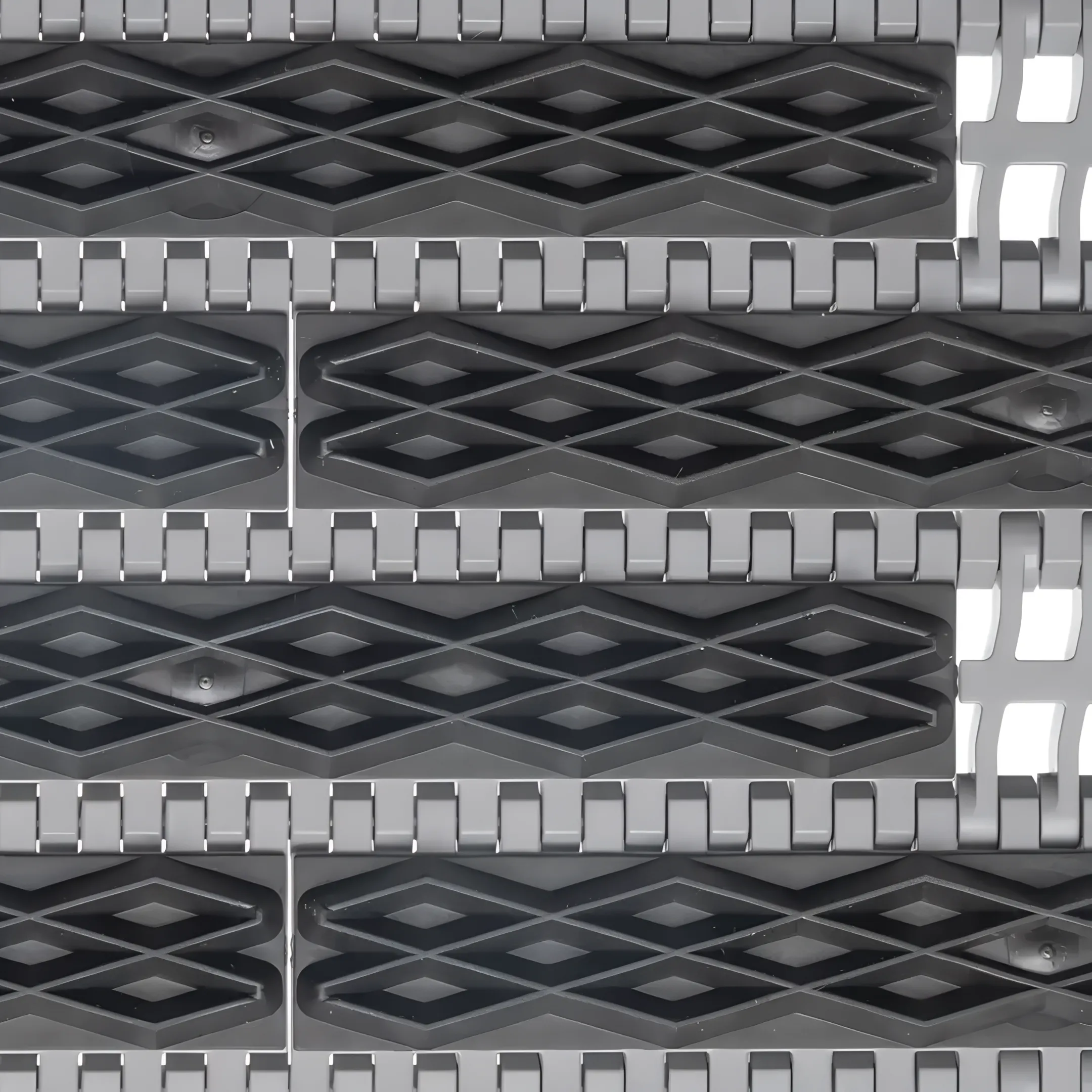Modular plastic belt conveyor in a manufacturing facility