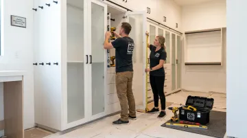 Utah Closet Connection team installing custom built-in cabinetry on-site