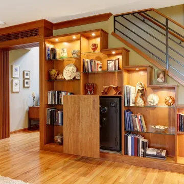 Custom hidden safe cabinet in a built-in bookcase