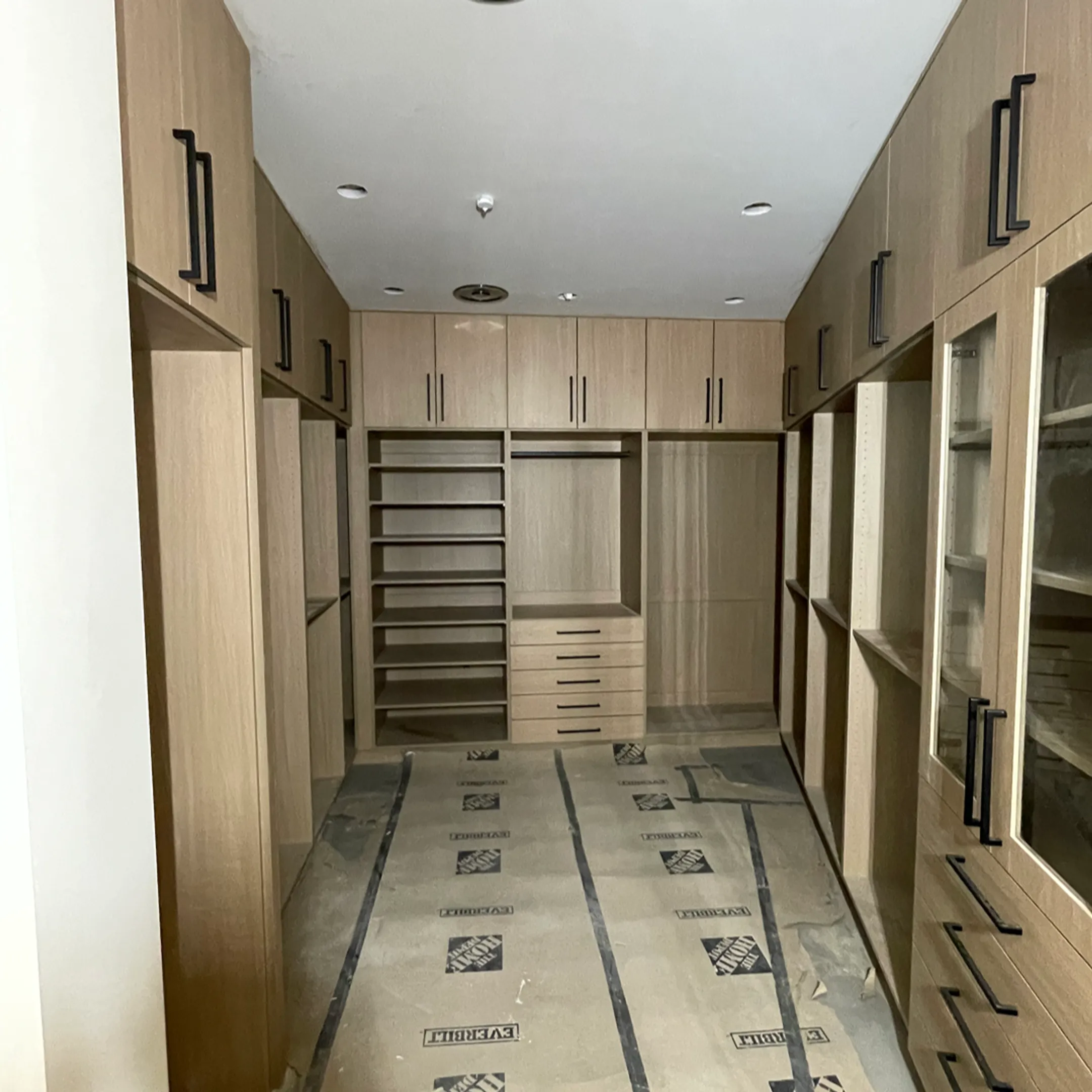 Designer planning a custom closet organizer